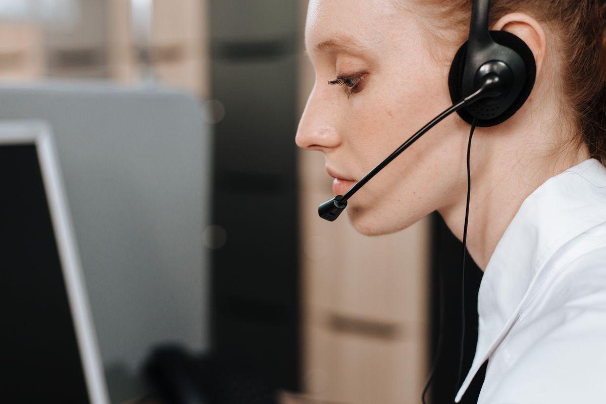 A call center agent wearing a headset